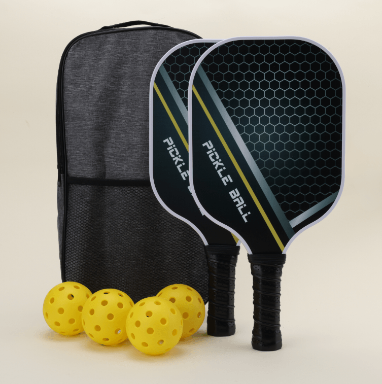 A pickleball set featuring four yellow hybrid pickleballs, two paddles, and a carrying bag, arranged neatly on a surface.
