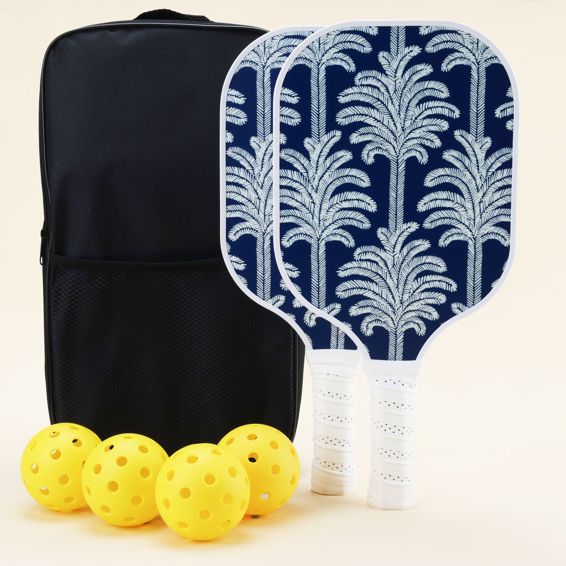 Complete Pickleball set, including 2 paddles, 4 balls, and a carry bag, designed for players of all skill levels, suitable for both indoor and outdoor play.