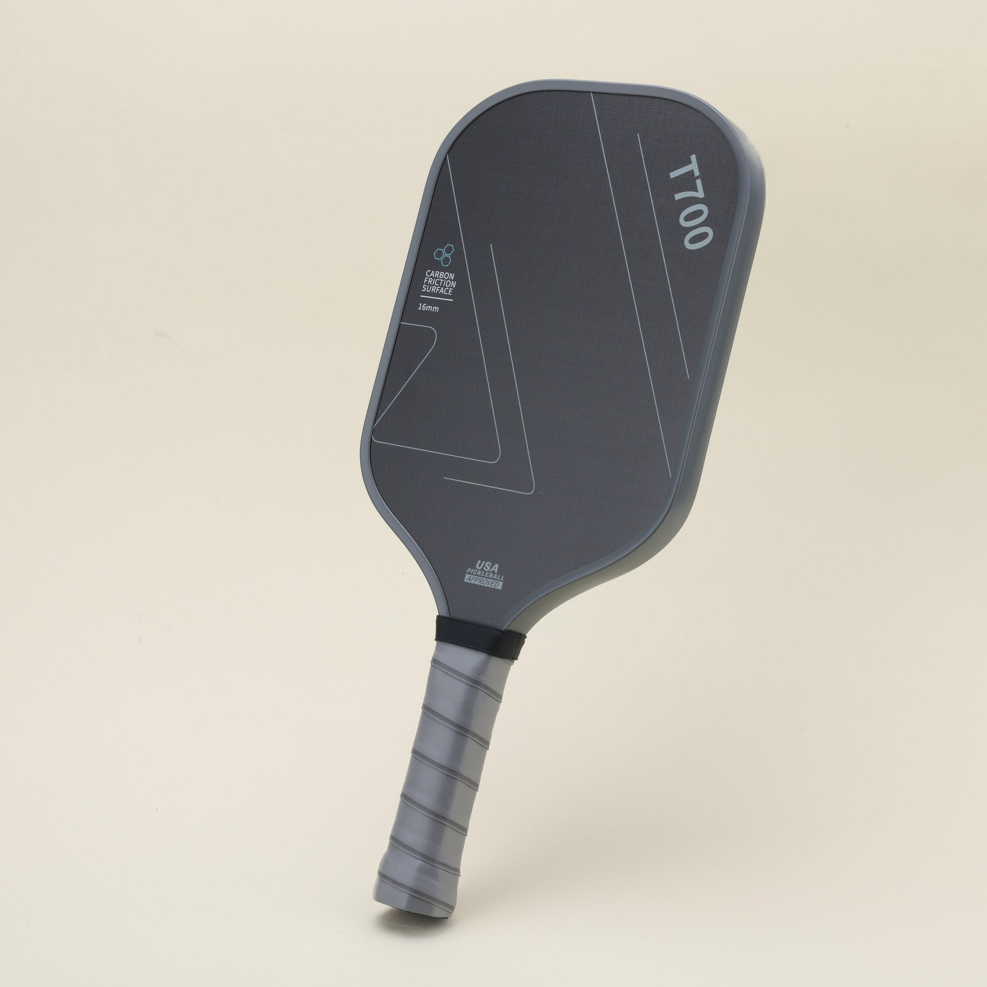 Left angle view of a pickleball paddle featuring a sleek black-gray color scheme with geometric patterns, designed for power and control, offering both modern style and superior performance.