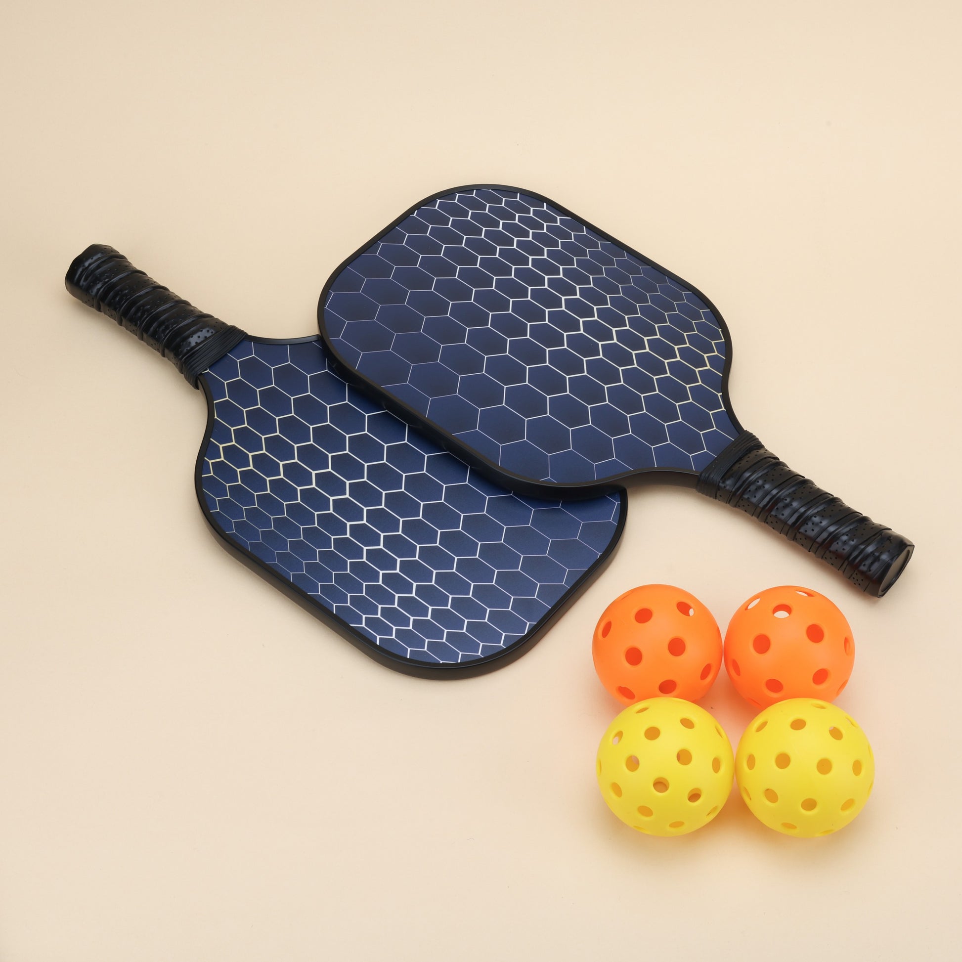 "A complete pickleball sports equipment set, including paddles, balls, and a protective net, ideal for beginners and experienced players alike."