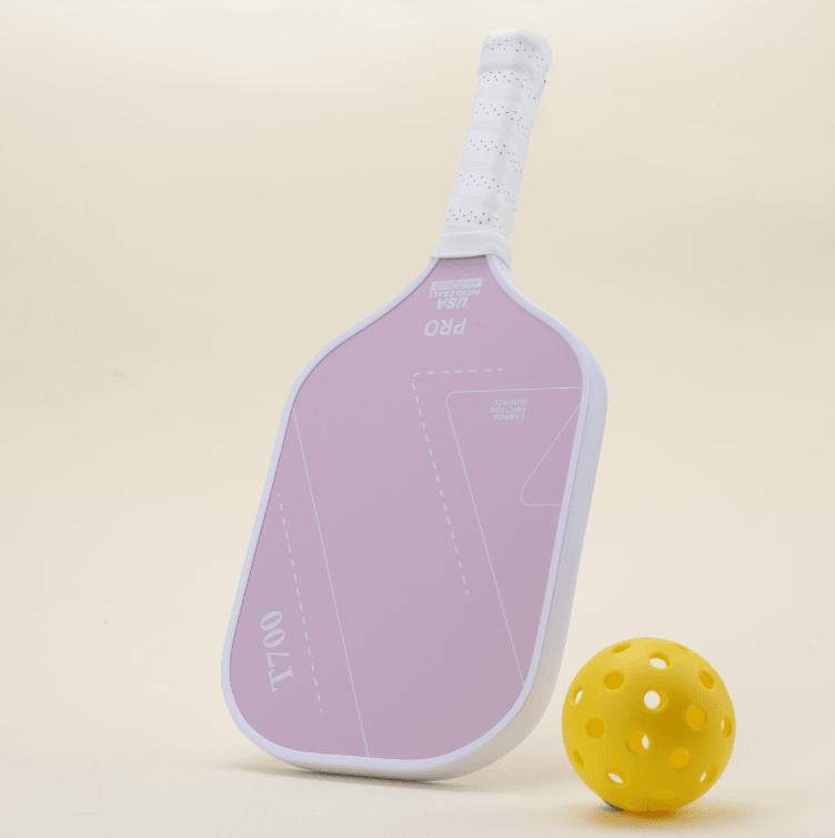 T700 pickleball paddle with an elegant and modern pink design, adding a trendy touch to your game and ideal for younger players and families, paired with a yellow hybrid pickleball for a complete set.