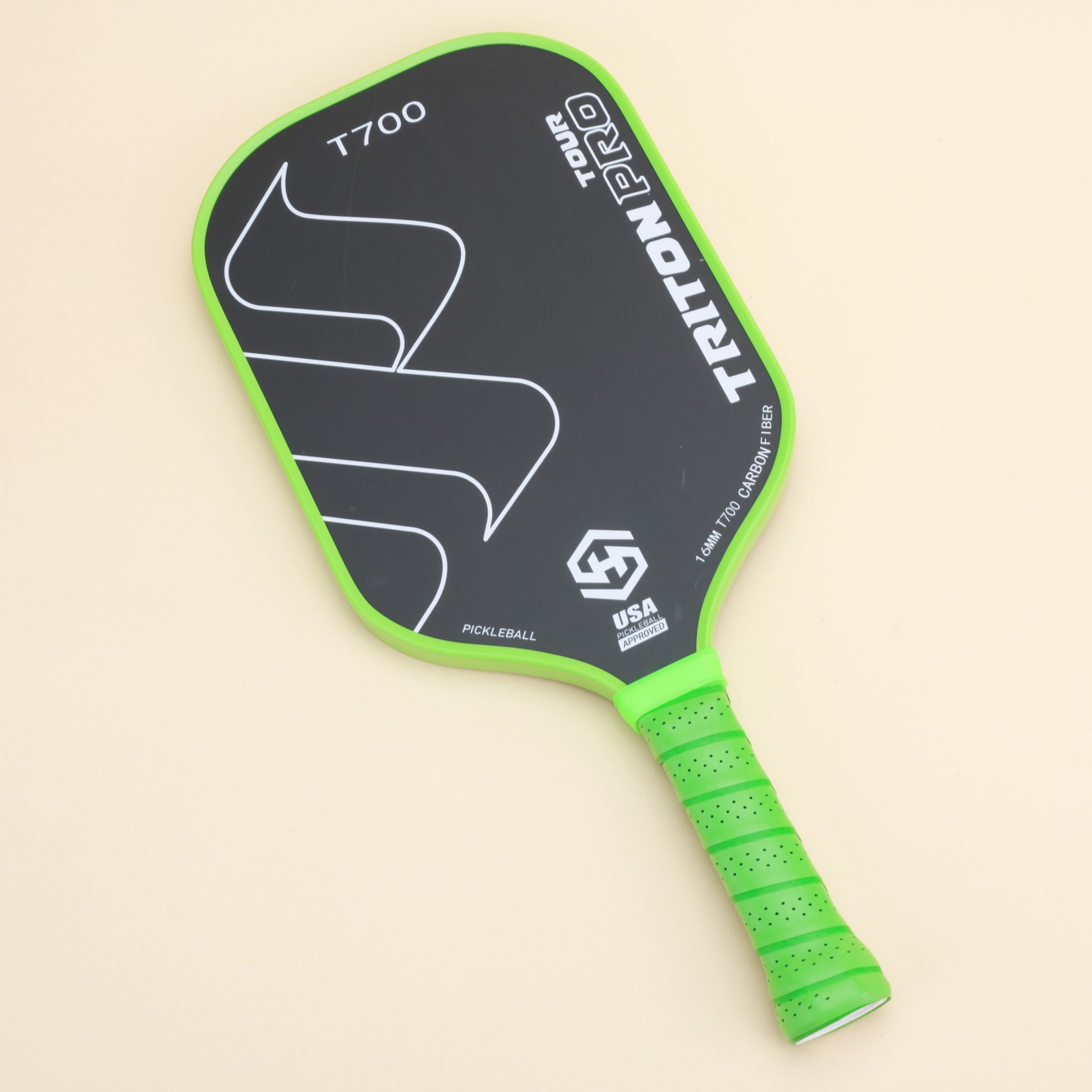 "Front view of the Triton Pro T700 pickleball paddle, featuring a USA-approved carbon fiber construction and a green ergonomic grip, designed for enhanced performance and control on the court."