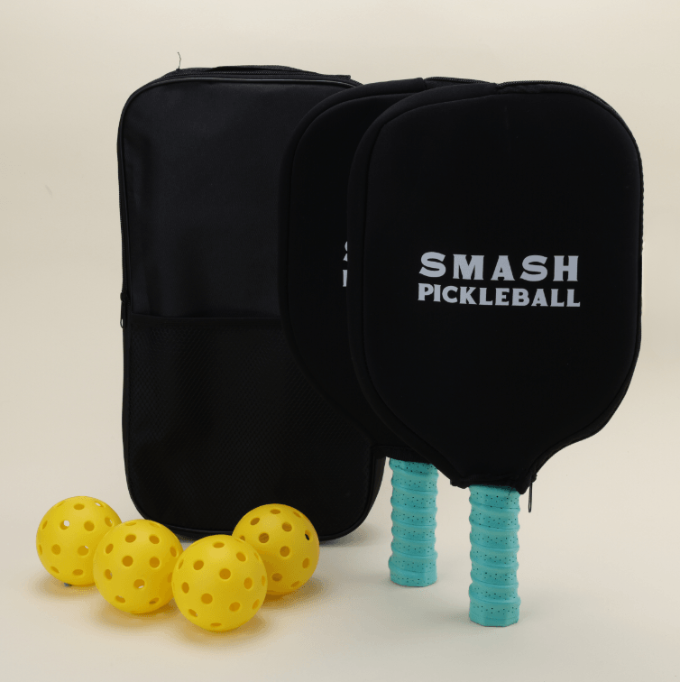 Two pickleball paddles featuring a unique blue abstract pattern, full of modern flair and energy, accompanied by four yellow pickleballs, two paddle covers, and a black pickleball carry bag, all arranged to showcase a vibrant and stylish set.