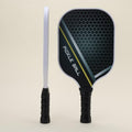 Two pickleball paddles, one displaying the side view and the other showing the front design, positioned side by side.