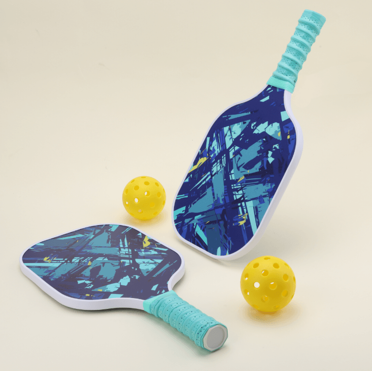 Two yellow hybrid pickleballs and a paddle featuring a unique blue abstract pattern, full of modern flair and energy, showcasing a vibrant and dynamic design.